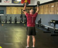 Man holding up weights